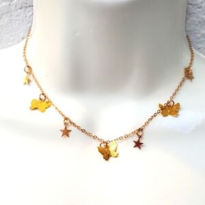 💚5/$25 Gold Tone Butterfly and Star Charm Necklace